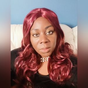 Beautiful soft flowing cinnamon spice color with with middle part 18 in